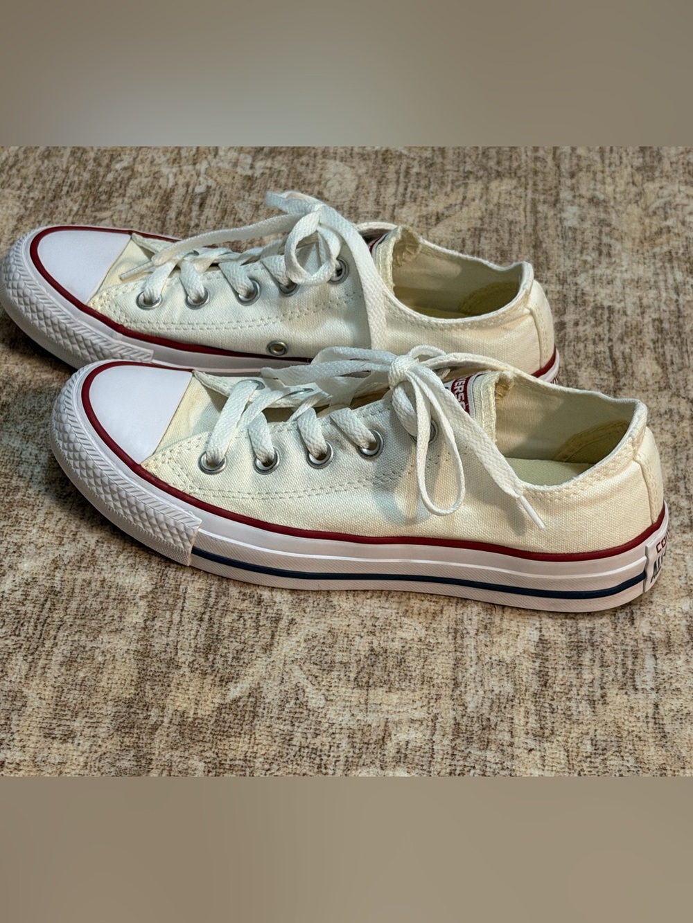 Unisex white Converse, Men’s size 4 and Women’s size 6